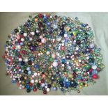 A large quantity of glass marbles.