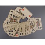 A set of 54 19thC Austrian tarot playing cards by Ferd. Piatnik & Sohne, Wien, having hand