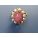 A cabochon ruby & pearl oval cluster ring - a/f.