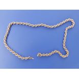 A modern 9ct gold rope twist necklace , 23".