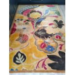 A modern Chinese hand woven Arts & Crafts style rug , originally purchased from Liberty - 'Chinese