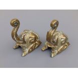 A pair of gilt brass elephant head wall light fittings, lozenge registration marks, 5.5" overall. (