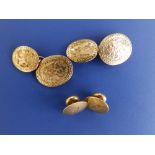 A pair of 18ct gold oval cufflinks and a pair of studs. (4)