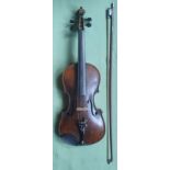 An antique cased violin with bow, the violin having one piece 14" back, the bow with floral inlaid