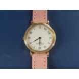 A boxed lady's 18ct gold Patek Philippe Calatrava quartz wrist watch, having white dial,