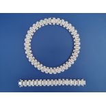 A diamond set white '18K' necklace & matching bracelet, the bold links of split cylinder form,