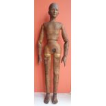 A 19thC artist's articulated wooden lay figure, 19" high.