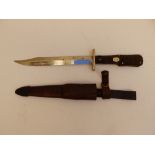 A dual-length folding hunting knife with chequered grip by Joseph Rodgers & Sons, 12" overall.