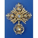 An antique Portuguese rose cut diamond set yellow metal pendant, of X shape embellished with