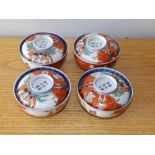 A set of four Japanese porcelain rice bowls with covers, 4.25" diameter