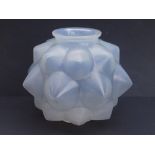 A Lalique opalescent glass 'champagne' pattern vase, of rounded form, the surface moulded with