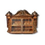 A bookcase/display cabinet made from oak from Nelson's flagship HMS Foudroyant with copper