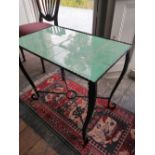 A modern iron tiled top occasional table, the rectangular pale green tiled top within a scalloped