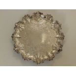 A Victorian Barnard Brothers silver salver, having elaborate flower & leaf scroll rim -