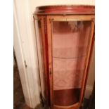 A brass mounted mahogany bow-fronted vitrine, Height 60", Width 28".