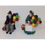 A Royal Doulton figurine 'The Old Balloon Seller' HN 1315 and 'The Balloon Man' HN1954. (2)