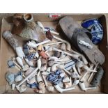 A collection of River Thames found clay pipes and bellarmine jug fragments.