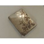 A Russian 84 silver cigarette case with floral engraved decoration to front, 4".