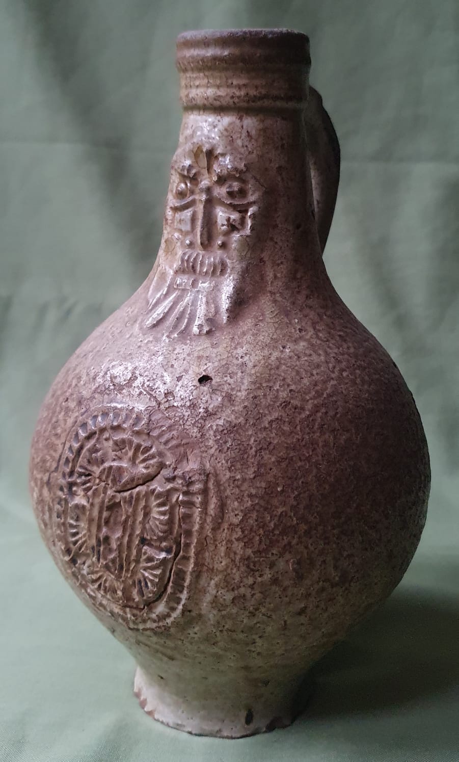 A 17thC bellarmine pottery jug of small proportions, 8.5" high. - Image 4 of 5