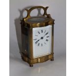 A brass carriage clock with white enamel dial - British Lion mark to backplate, 4.6" high