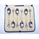 A cased set of six Mappin & Webb enamelled silver coffee spoons, having green & white daisy handles,