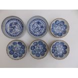 A set of four small Oriental blue & white porcelain dishes decorated roundels, 3.8" diameter - one