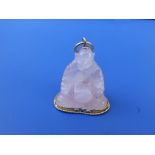 A rose quartz seated Buddha pendant with Italian 18K mounts, 1.3" high.