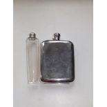 A large plated hip flask, 8.25" overall and a glass drinking flask. (2)