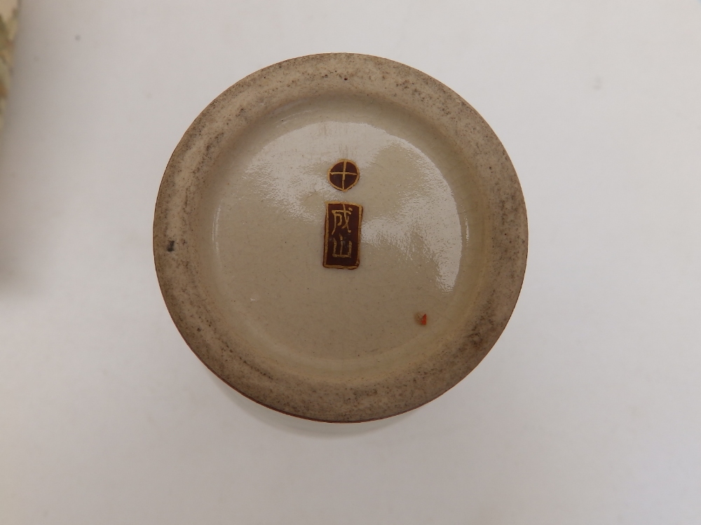 A signed pair of Japanese Meiji period earthenware Satsuma vases, of shouldered form, decorated with - Image 6 of 7