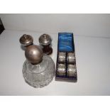A pair of London silver topped wooden pepper mills, a cut glass scent bottle and a cased set of four