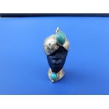 A turquoise set blackamoor head pendant with 750 mounts, 1.3" high.