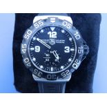 A boxed gent's stainless steel Tag Heuer Formula 1 Professional wrist watch with black dial, on