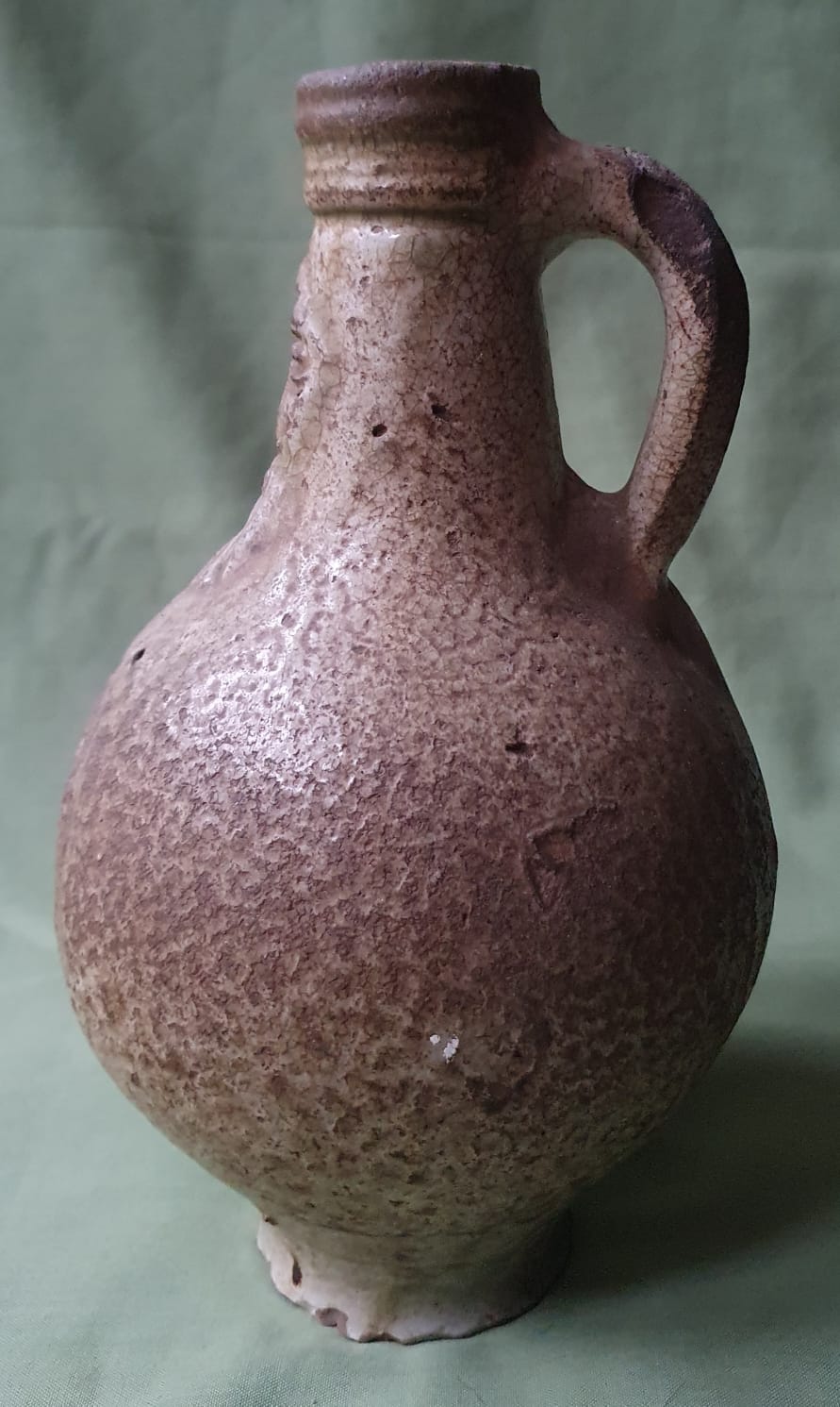 A 17thC bellarmine pottery jug of small proportions, 8.5" high. - Image 3 of 5