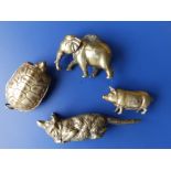 A brass fox vesta 3.9" , two others and an elephant pin cushion. (4)