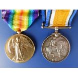 A WWI medal duo War & Victory Medals awarded to 670 Pte. J. Eveleigh R.Ir. Regt. from Honiton,