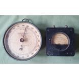 A military Short & Mason barometer (1941), 5.1" diameter and a 1944 Voltmeter. (2)