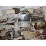 55 early postcards relating to Teignmouth, some photographic, including Pier scenes.