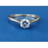 A diamond solitaire ring, the claw set brilliant weighing approximately 0.50 carat, on 18ct shank.