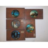 Five colour painted circular glass lantern slides in 7" rectangular mahogany frames - 'Blue
