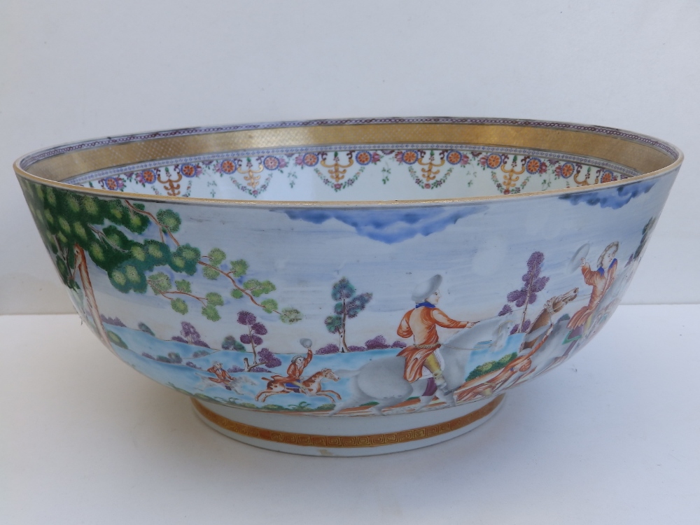 An 18thC Chinese porcelain punch bowl, finely painted with a continuous fox-hunting scene, 14.5" - Image 4 of 20