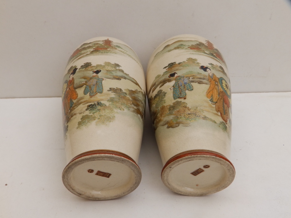 A signed pair of Japanese Meiji period earthenware Satsuma vases, of shouldered form, decorated with - Image 5 of 7