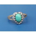 An antique turquoise & rose cut diamond set 18ct gold ring, the oval turquoise within a heart shaped