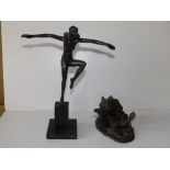 An art deco spelter figure of a dancing girl on black marble base, 11" high.