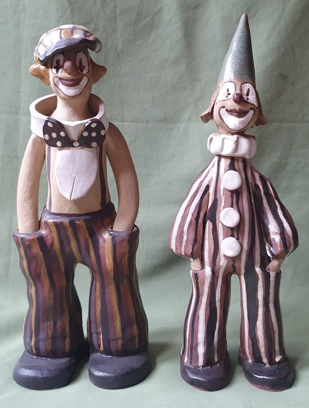 Two studio pottery clown figures by Elizabeth Haslam, the taller 11.5".