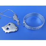 A Red Sea Divers 925 pendant on chain, a modern silver bangle and a free form pendant. (3)