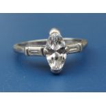 A marquise diamond solitaire ring, the four-claw set stone weighing approximately 0.80 carat,