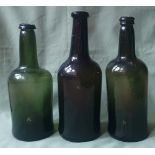 Three antique blown glass bottles, tallest 11.25".