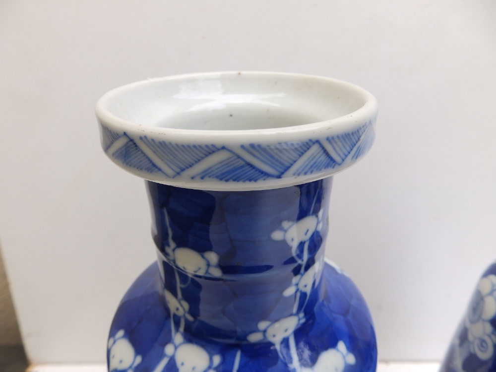 A pair of Chinese blue & white porcelain hawthorn pattern rouleau shaped vases - bearing six - Image 8 of 8