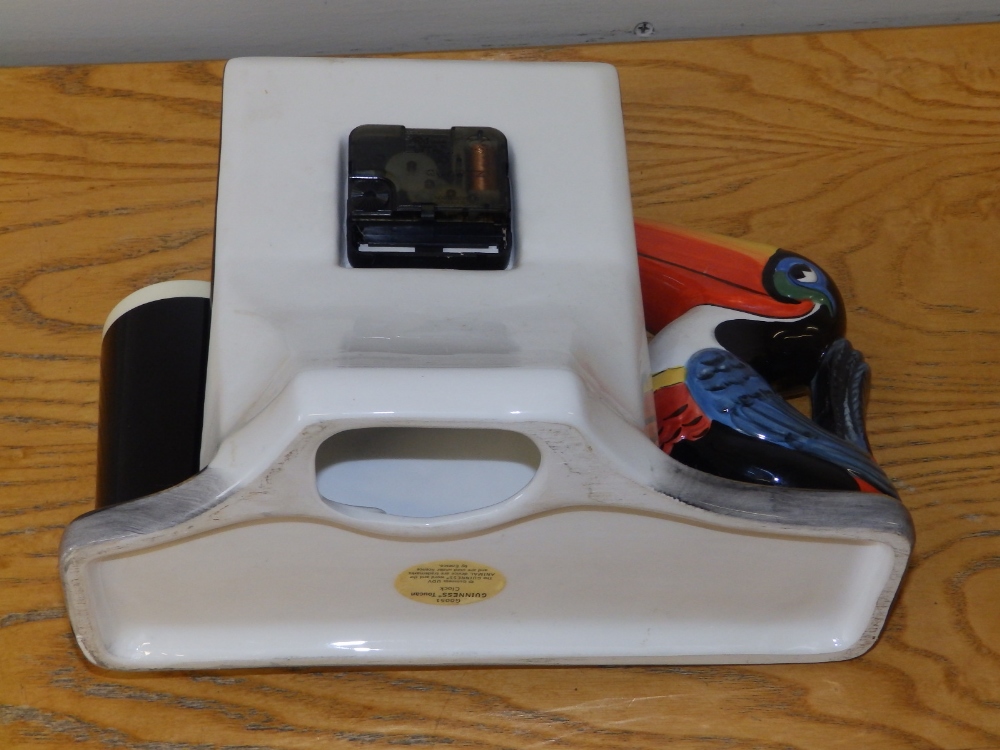 A late 20thC 'Guinness Time' Toucan battery table clock - working order, 8.5" high. - Image 2 of 2