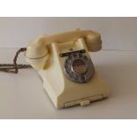 A 1960's white bakelite telephone - 'Leyland 422583'.
